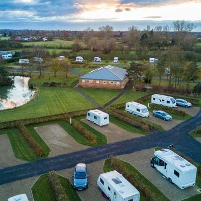 Guests enjoy a relaxing sunset over York Caravan Park, the only 5-Star Caravan Park exclusively for Adults in York City, North Yorkshire